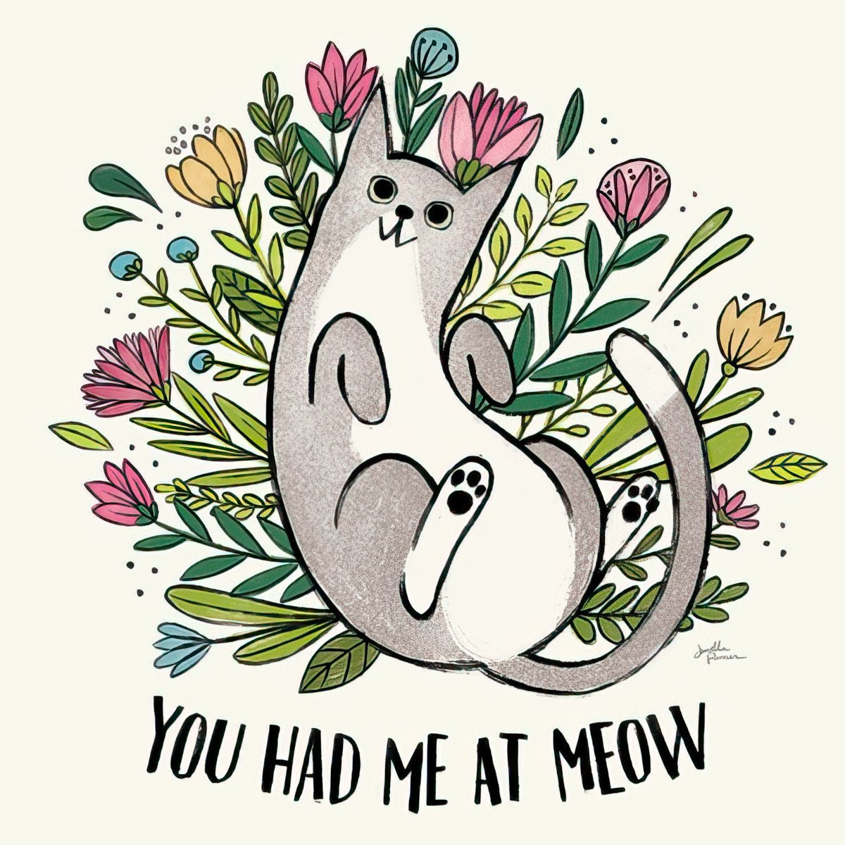 Cute cartoon cat with gray and white fur, belly up, surrounded by colorful pink, yellow, and blue flowers and green leaves. Text reads 'You Had Me At Meow'.