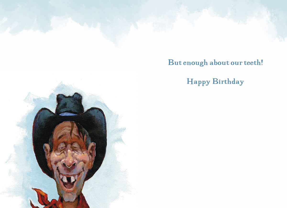 Inside of funny cowboy birthday card: close-up of toothless cowboy, text reads 'But enough about our teeth! Happy Birthday'.