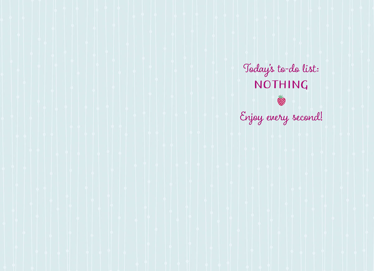 Inside of a light blue greeting card with text "Today's to-do list: NOTHING Enjoy every second!" and a small strawberry.