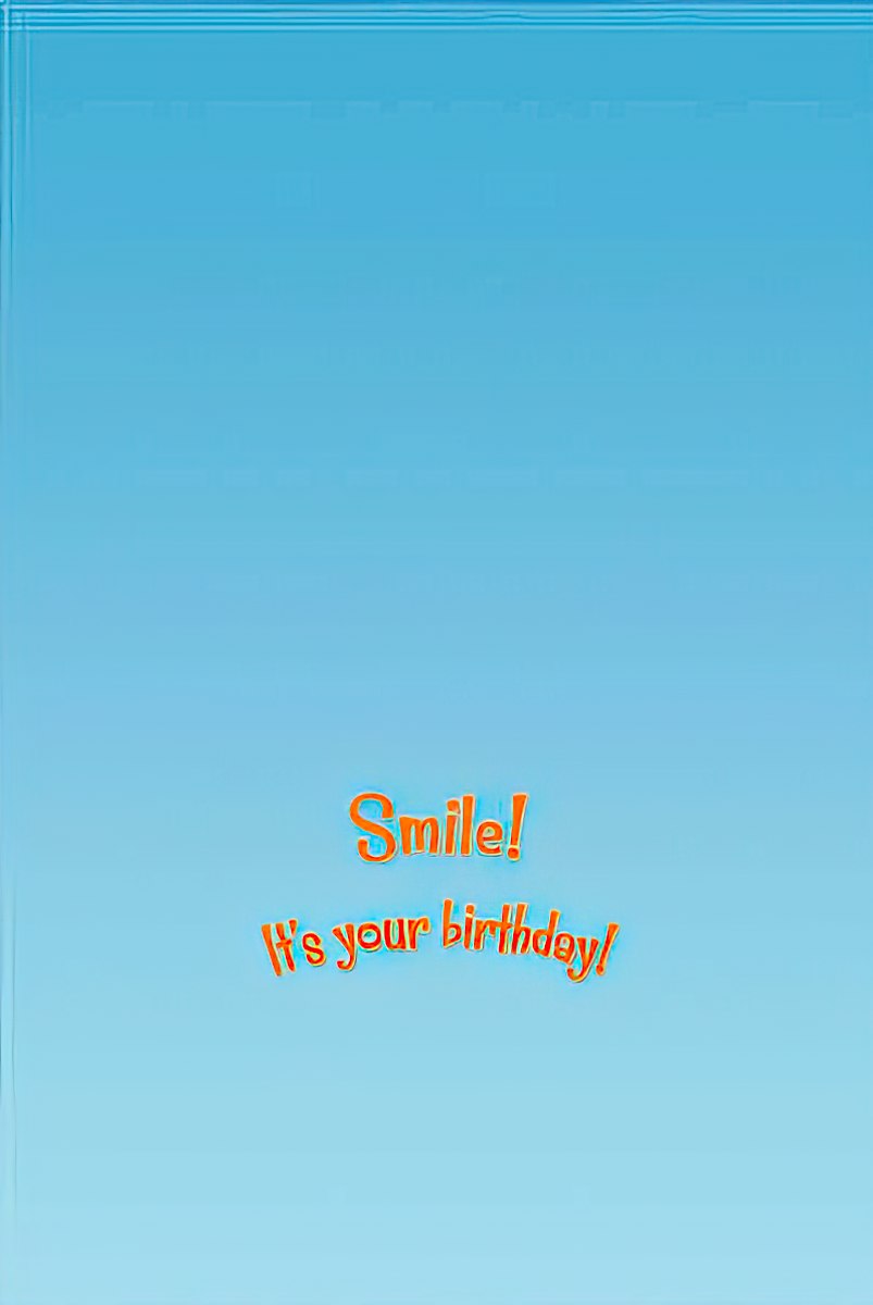 The inside of a birthday greeting card with a light blue background and the orange text "Smile! It's your birthday!" centered.