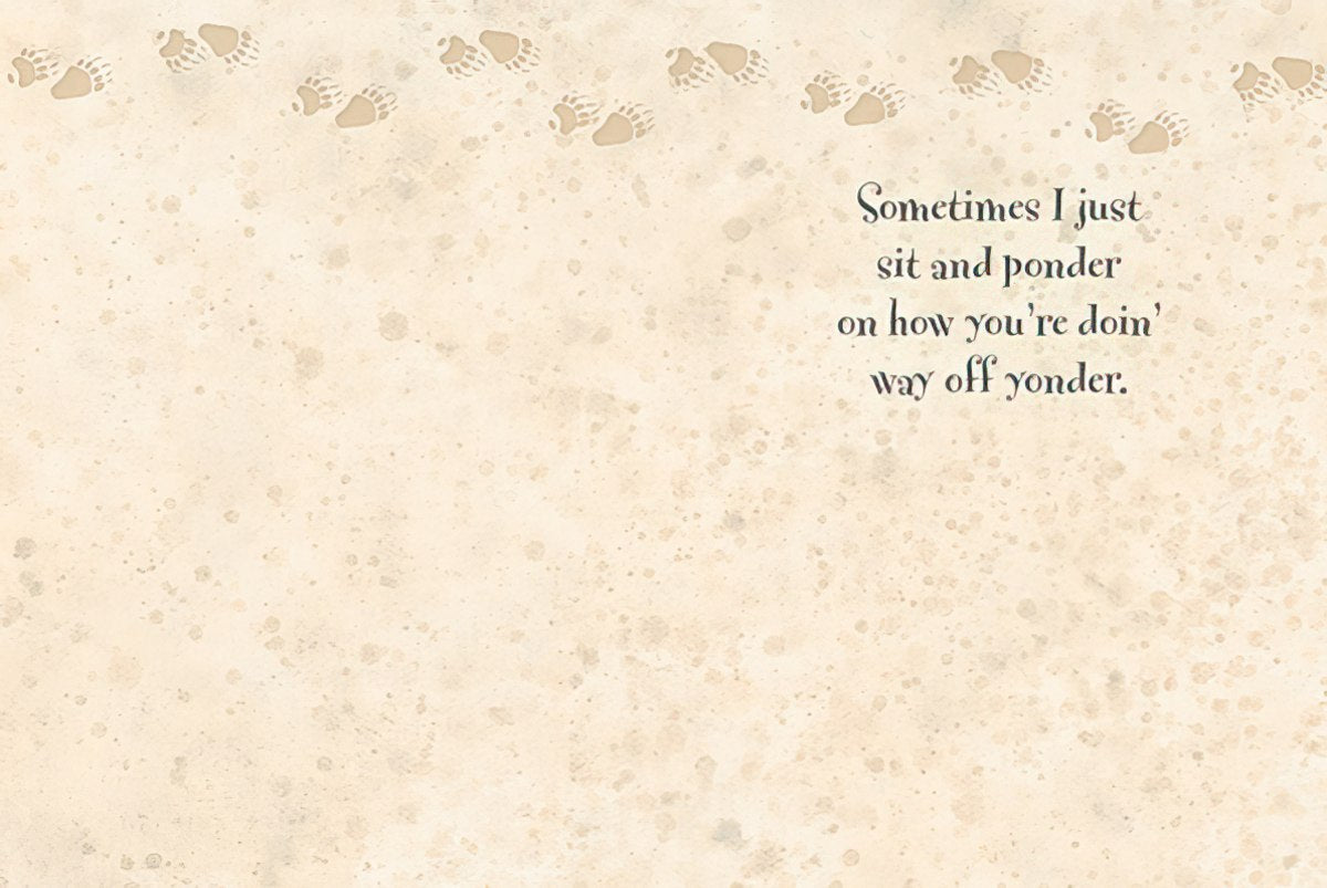Inside of a greeting card with a thoughtful message, "Sometimes I just sit and ponder...", and subtle paw print design.
