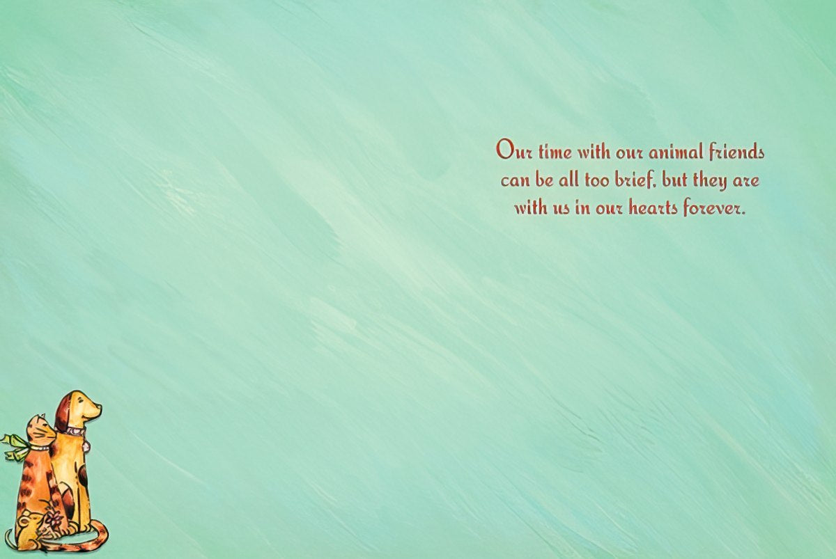 Inside of a pet sympathy card with a comforting message and illustrations of a dog and cat on a light blue background.