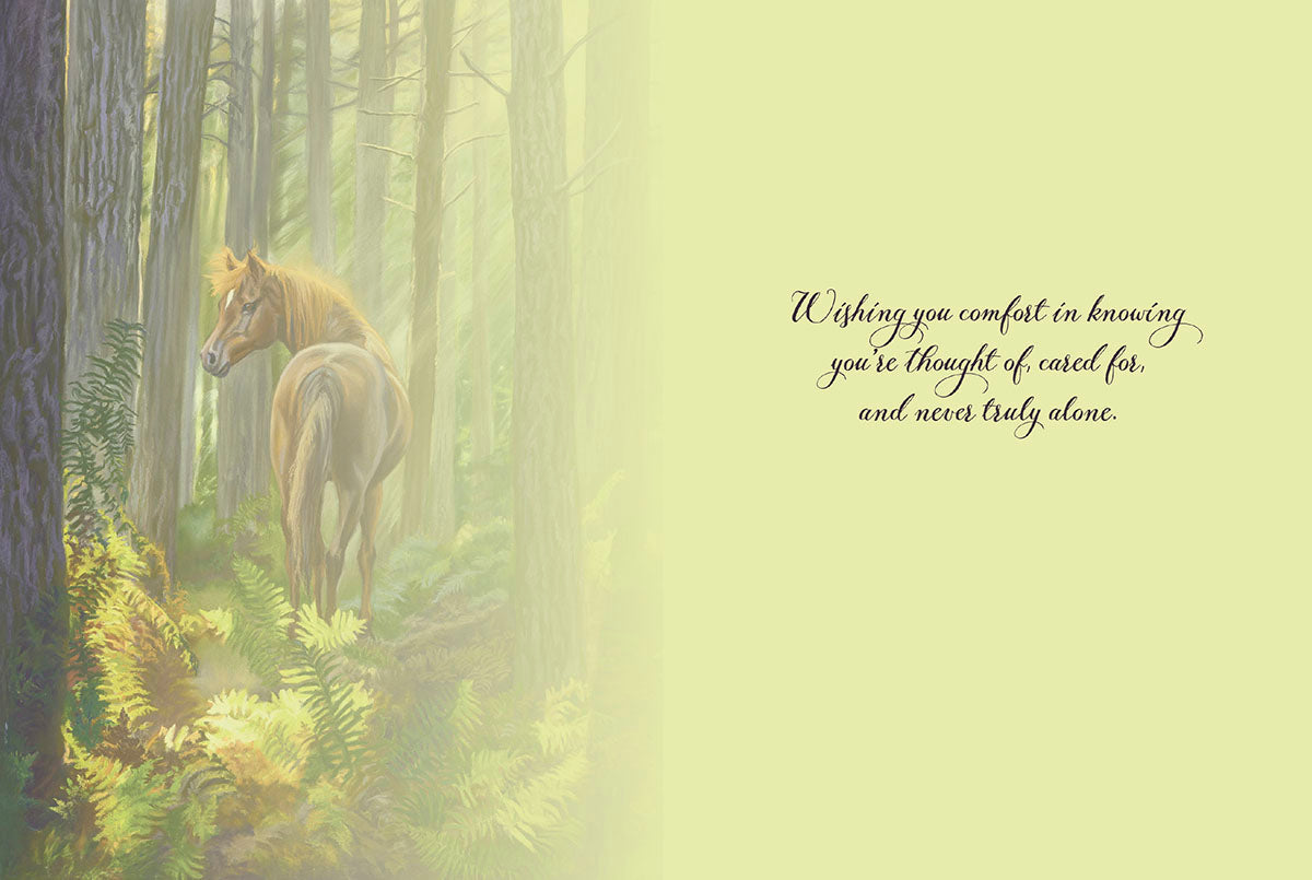 Inside of a thoughtful greeting card featuring a horse illustration on the left and a heartfelt message of comfort on the right.