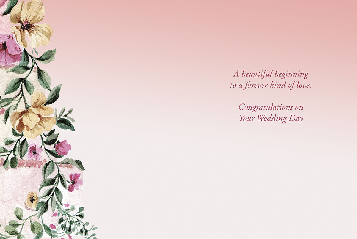 Inside wedding card with watercolor floral cake design and heartfelt message: 'A beautiful beginning to a forever kind of love. Congratulations.'