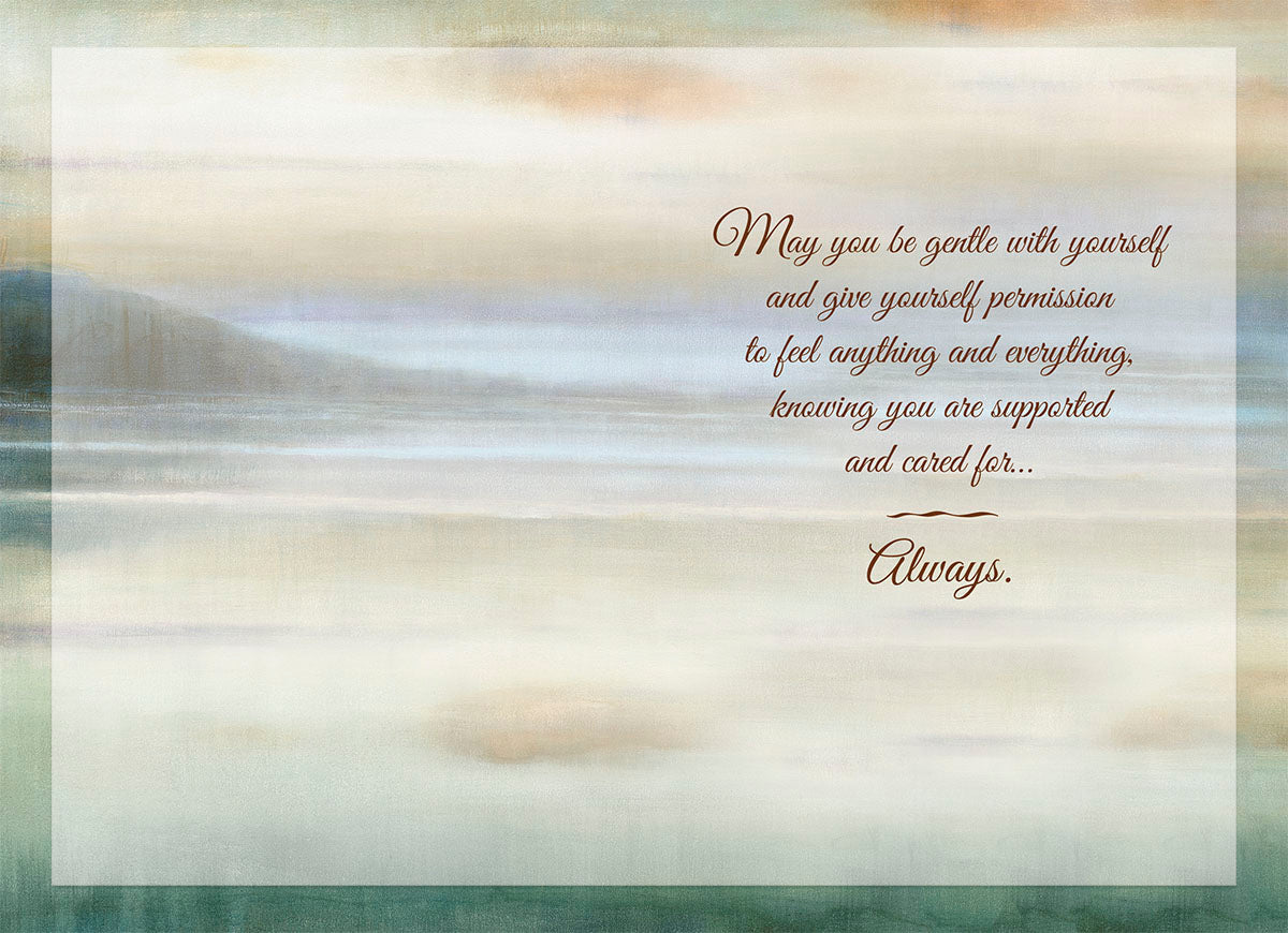 Inside of a sympathy greeting card with abstract landscape art and a message of self-compassion, support, and care.