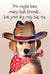 Lab puppy dressed as cowboy