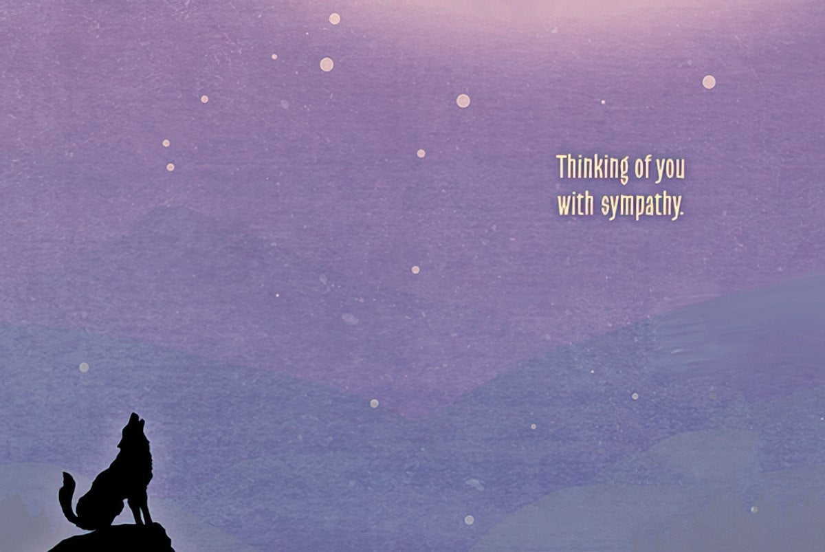 Interior of sympathy card featuring a subtle wolf silhouette under a starry sky with the message 'Thinking of you with sympathy'.