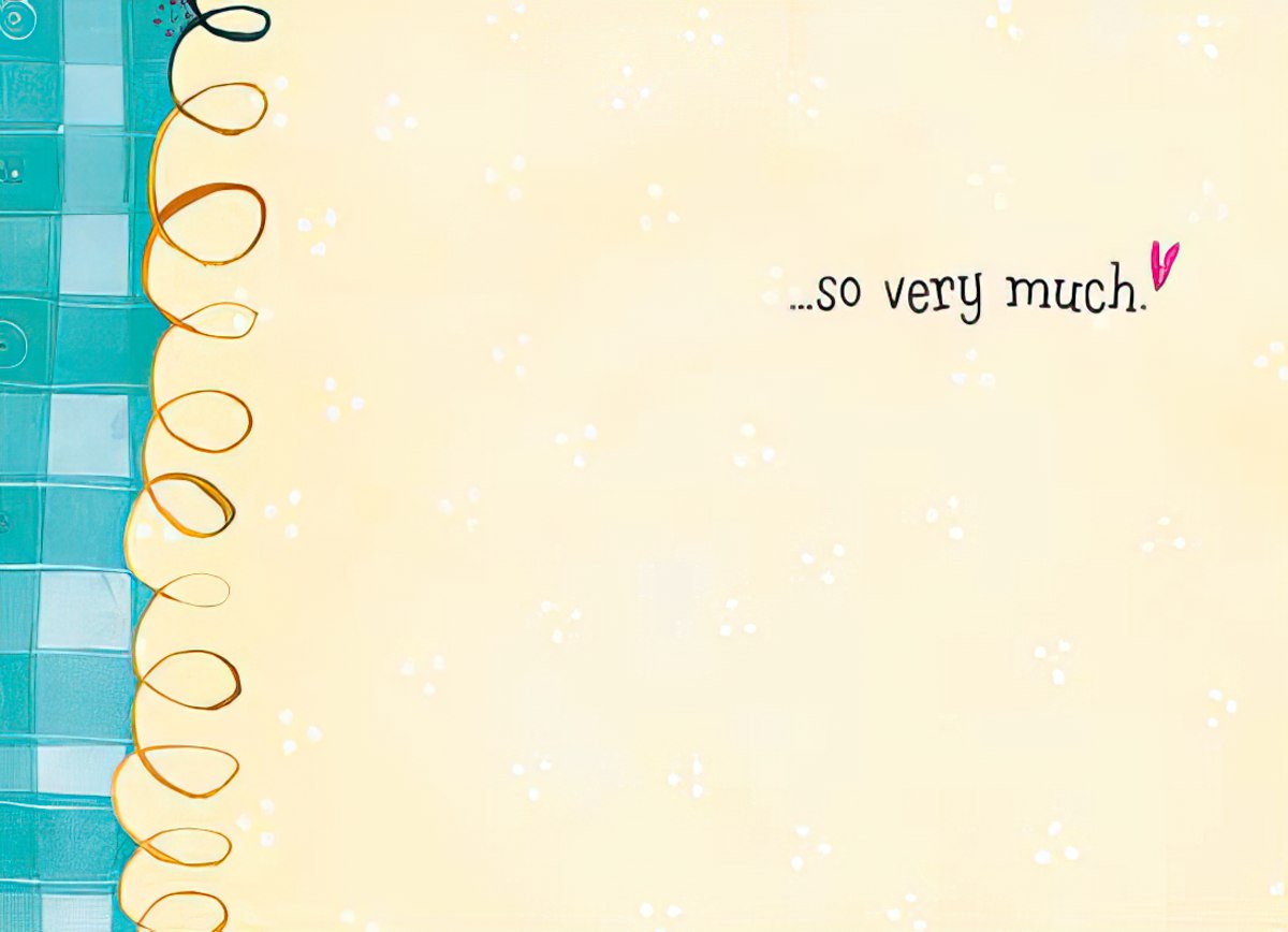 Inside of a card featuring a sunflower bucket, simple white with a festive birthday message in purple.