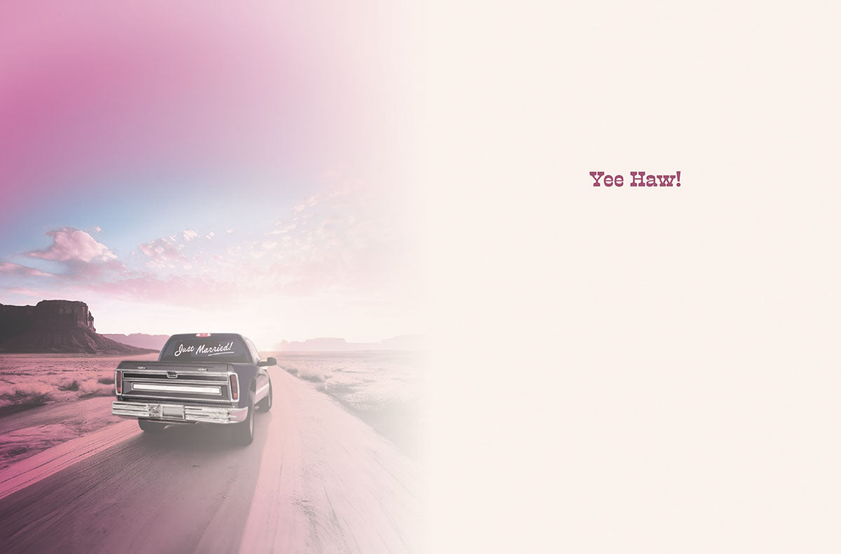 Inside of a greeting card with a 'Just Married!' truck on the left and 'Yee Haw!' text on the right side of the card.