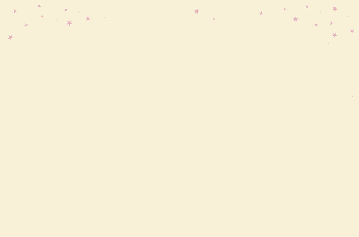 A blank light yellow-cream greeting card interior, speckled with small pink stars at the top edges.