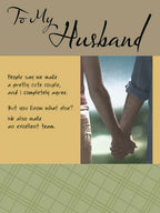 Romantic greeting card for husband featuring a couple holding hands, with heartfelt text: 'To My Husband... We make an excellent team.'
