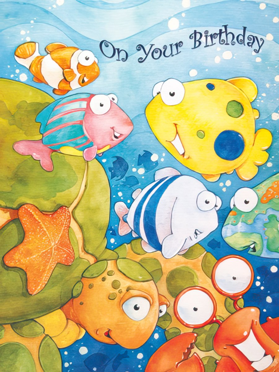 Front of a birthday card with cheerful cartoon fish, turtles, starfish, and a crab underwater, with 'On Your Birthday' text.