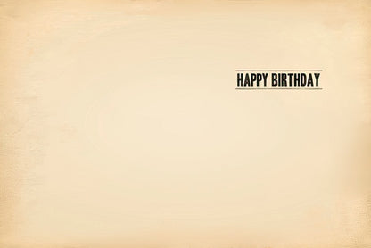 Inside of a vintage-look greeting card with 'HAPPY BIRTHDAY' printed in an old newspaper font on a cream background.