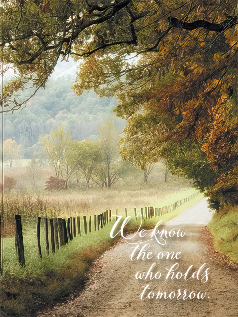 Religious encouragement greeting card featuring a scenic path through autumn trees and fields with the comforting message 'We know the one who holds tomorrow.' Perfect for sending faith and support.