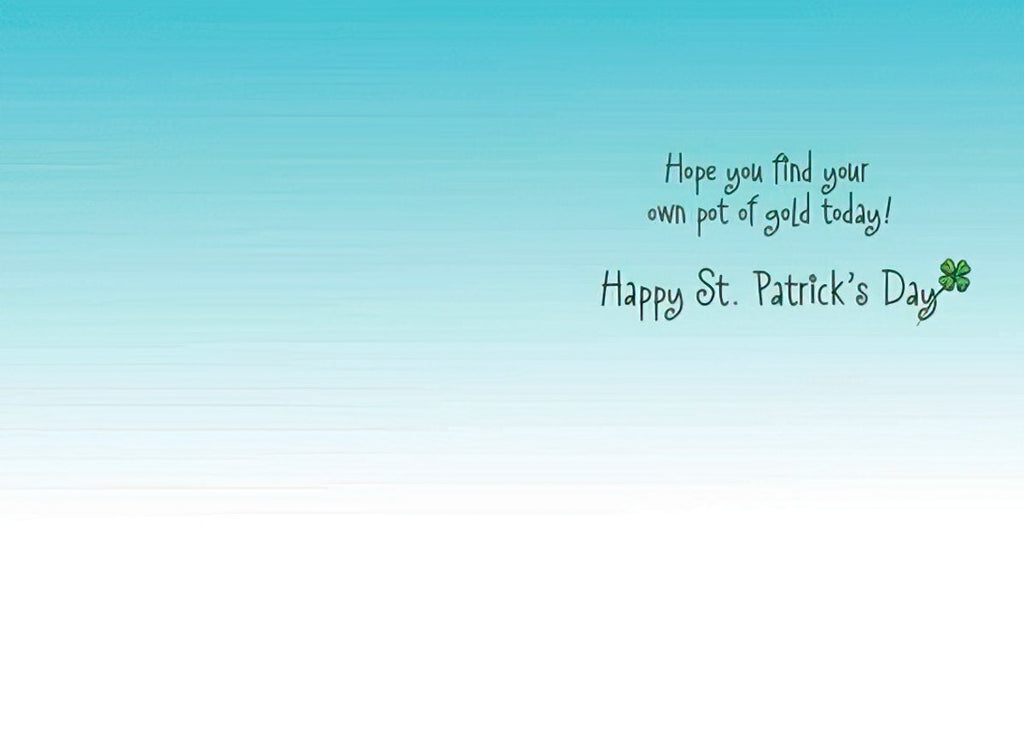 Inside of a St. Patrick's Day greeting card with a light blue gradient background, featuring the message "Hope you find your own pot of gold today! Happy St. Patrick's Day" written in a playful script, accompanied by a small green shamrock.