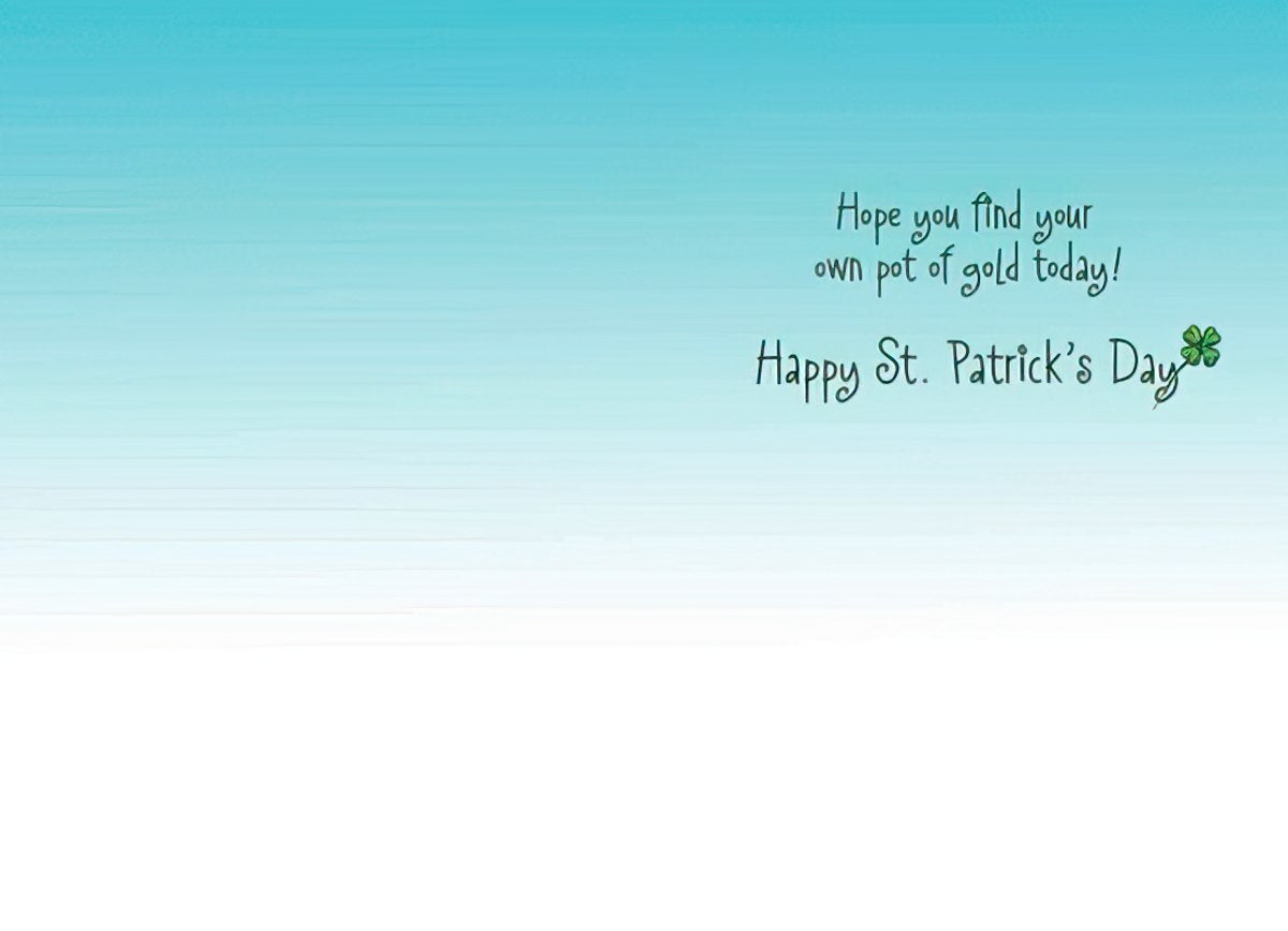 Inside of a St. Patrick's Day greeting card with a light blue gradient background, featuring the message "Hope you find your own pot of gold today! Happy St. Patrick's Day" written in a playful script, accompanied by a small green shamrock.