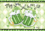 Vibrant St. Patrick's Day greeting card front with two overflowing green beer mugs, shamrocks, lucky horseshoes, and the celebratory toast 'May your glass be ever full.'