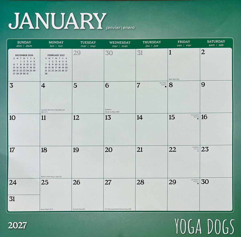 Close-up of a 2027 January monthly calendar grid with 'YOGA DOGS' branding, showing dates and holidays. Illustrates the calendar's practical layout and theme.