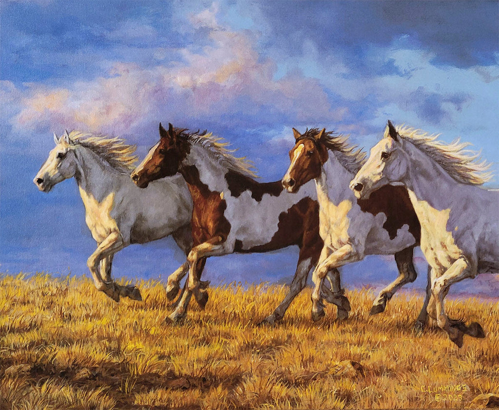 Powerful painting of four wild horses, two white and two pinto, galloping across a golden grassy field under a dramatic sky.