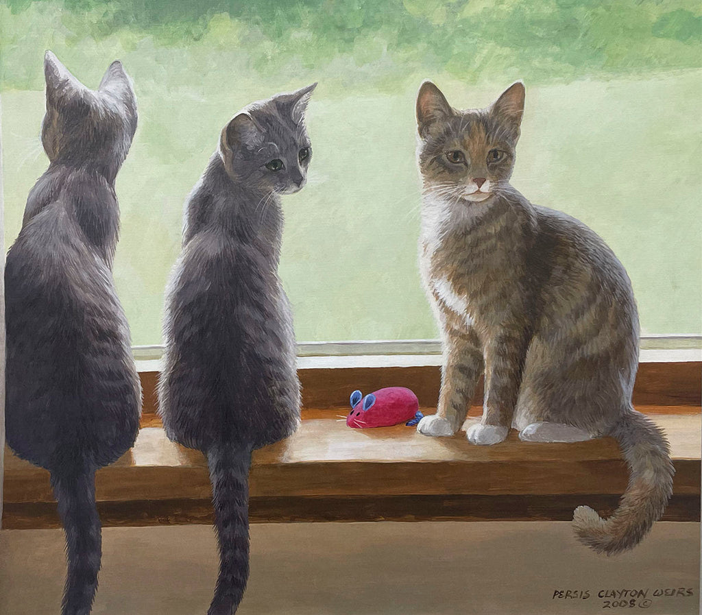 Three domestic cats sitting on a wooden windowsill; two grey tabbies with their backs to the viewer, and one calico facing front, next to a pink mouse toy.