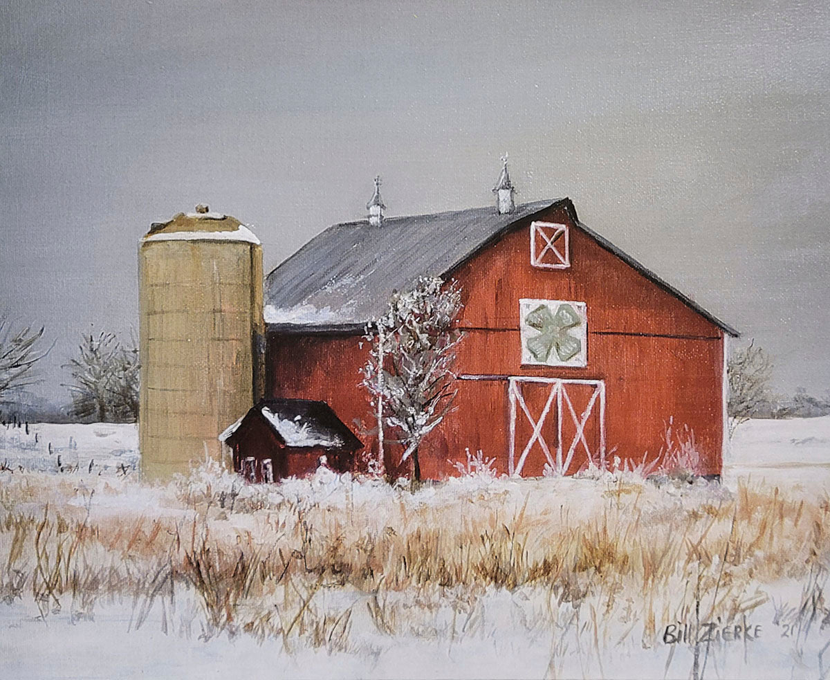 Classic red barn with a prominent barn quilt, a silo, and a small tree, depicted in a Bill Zierke winter farm scene.