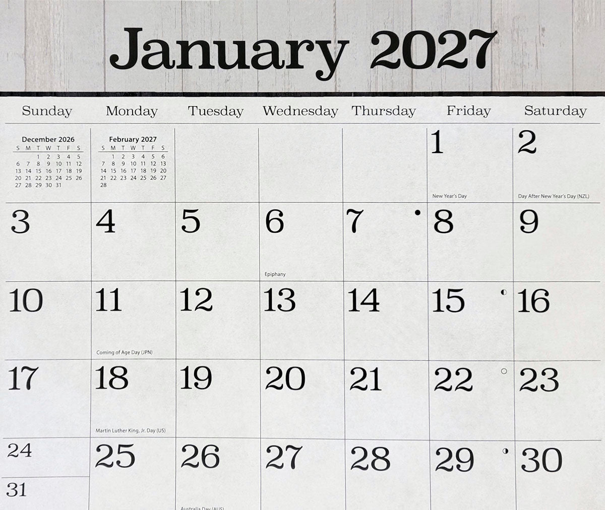 Detail of the January 2027 calendar grid, displaying clear dates, holidays, and mini previous/next month views for easy planning.