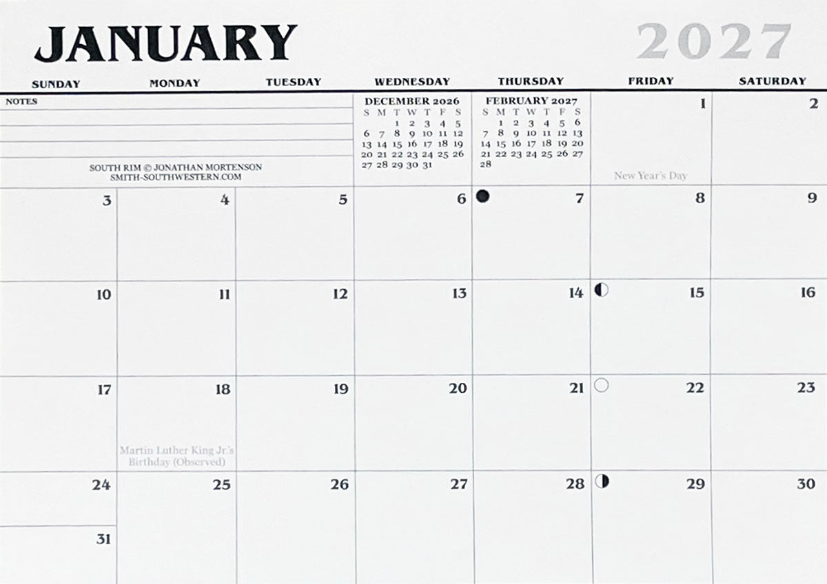 Close-up of a 2027 January calendar page, showing dates, holidays, and space for notes, with a credit for 'South Rim - Jonathan Mortenson', highlighting practical planning features.