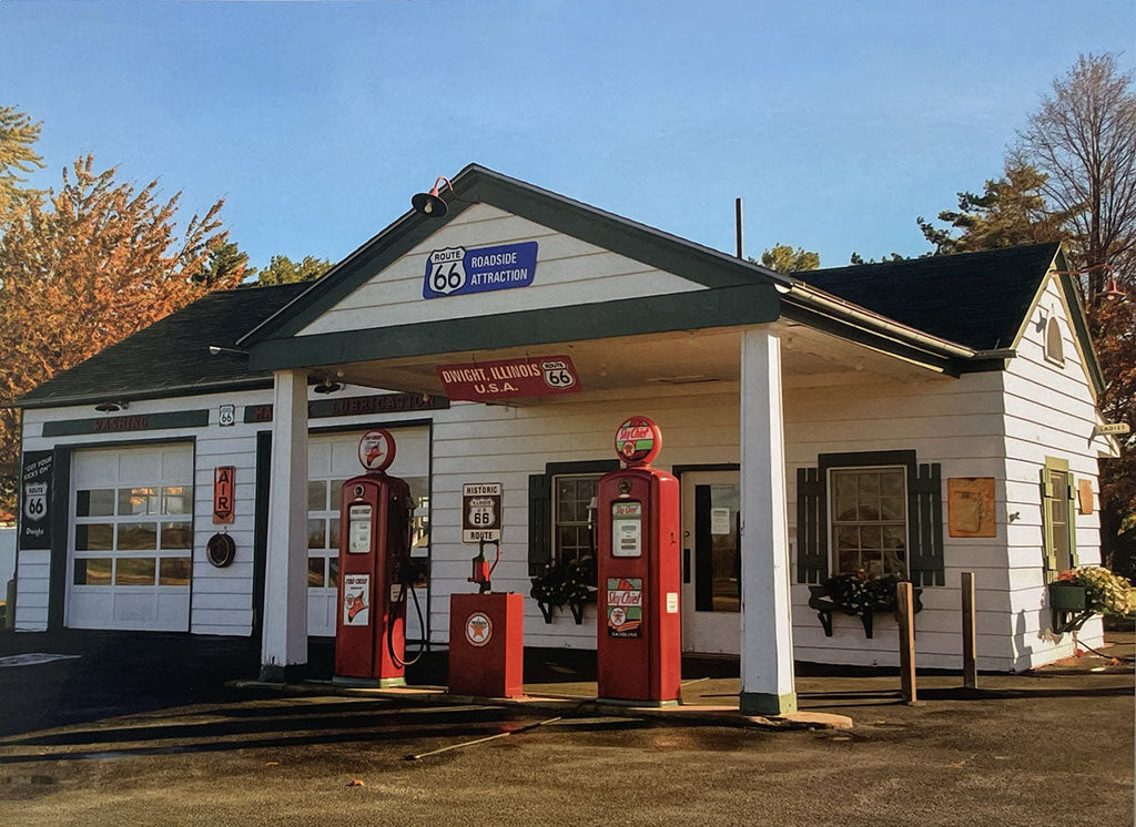 Well-preserved historic Route 66 gas station in Dwight, Illinois, with classic pumps and architectural details.