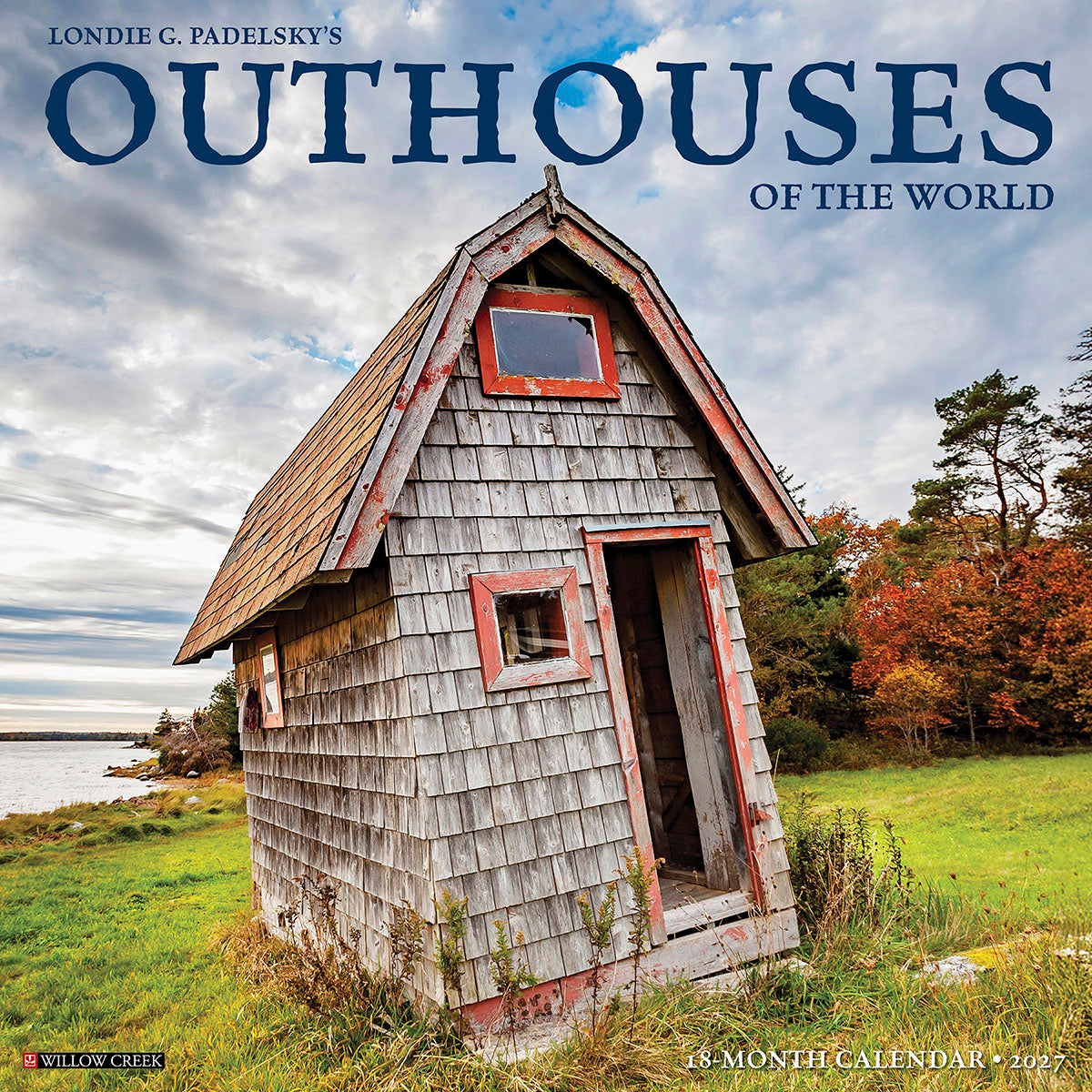 Front cover of 'Londie G. Padelsky's Outhouses of the World 2027 18-Month Wall Calendar' featuring a weathered, red-trimmed wooden outhouse by a scenic waterfront with autumn trees under a cloudy sky.