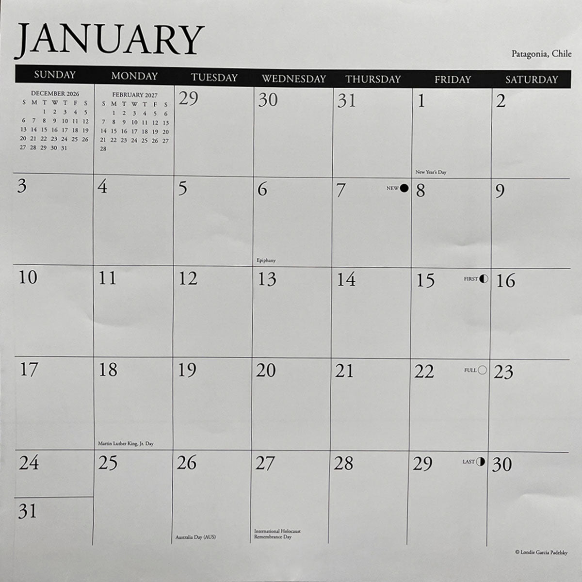Detailed view of the January 2027 calendar grid, showing dates, moon phases, and holidays like New Year's Day, Martin Luther King, Jr. Day, Australia Day, and International Holocaust Remembrance Day, for planning and organization.