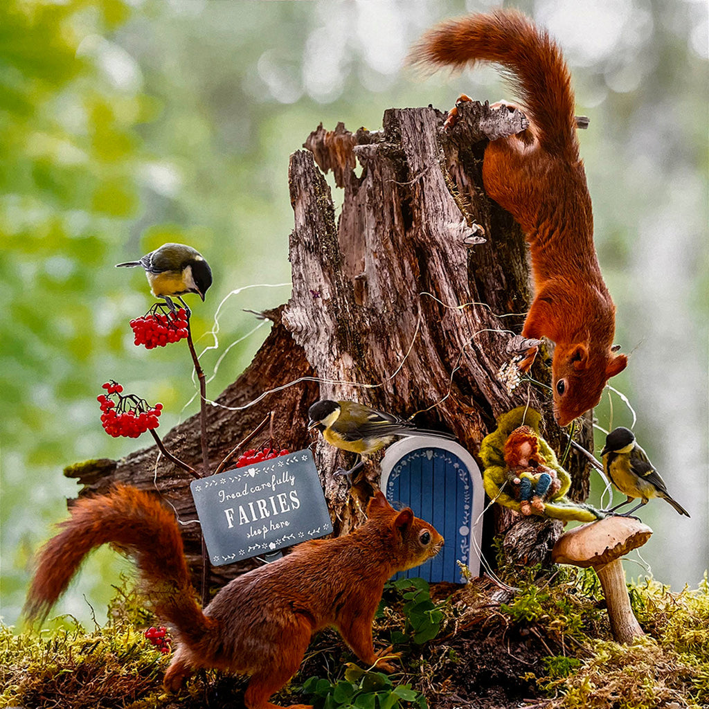 Two curious squirrels and several small birds gathered around a miniature fairy house built into a tree stump, with berries and moss, a magical woodland scene for a whimsical calendar.