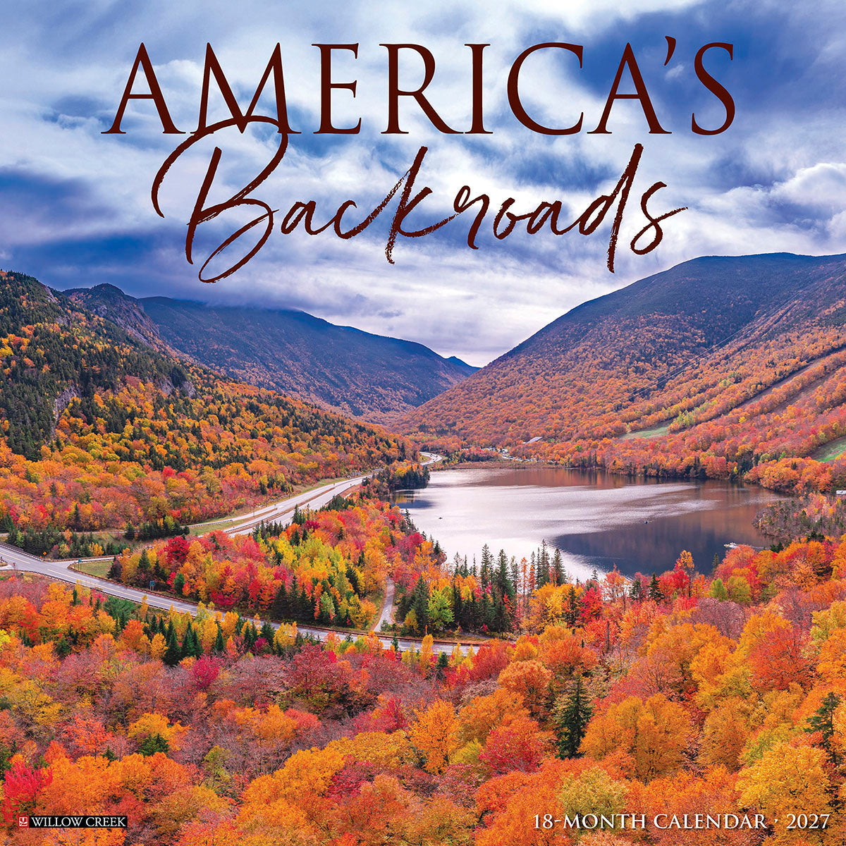America's Backroads 18-month 2027 wall calendar cover showing an aerial view of a vibrant autumn valley with a serene lake, a winding road, and mountains covered in red, orange, and yellow fall foliage under a dramatic, cloudy sky. Willow Creek logo and '18-MONTH CALENDAR · 2027' text are visible.