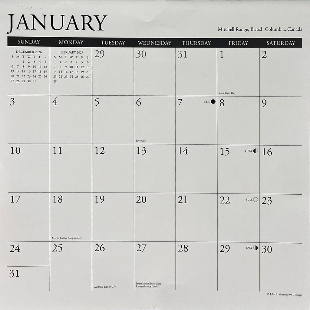 Close-up of a wall calendar's January 2026 month grid, showing dates, moon phases, and various observed holidays like New Year's Day, Martin Luther King Jr. Day, Australia Day, and International Holocaust Remembrance Day. SEO: January 2026 calendar page, monthly grid, holidays, date planner, wall calendar functionality.