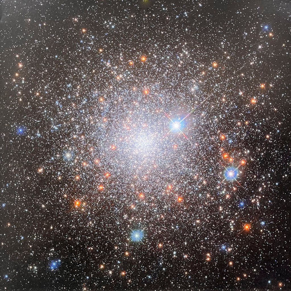 Densely packed globular cluster of myriad stars, appearing as a brilliant, glowing ball of light in the dark cosmos.