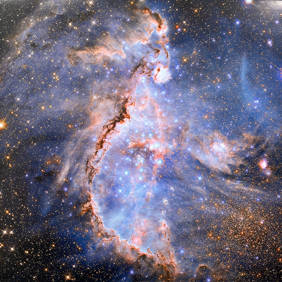 Towering cosmic pillars and glowing gas clouds, intricately shaped by stellar winds in an active star-forming region.