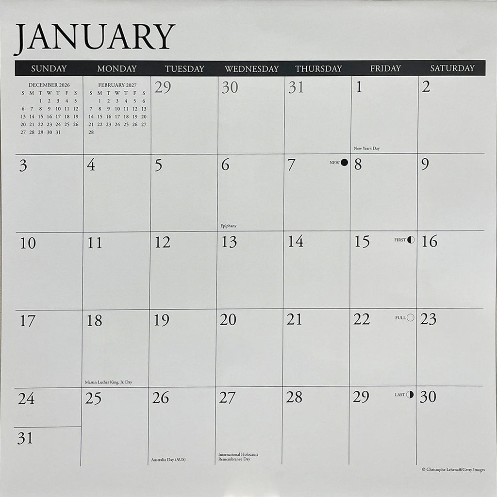 Close-up of a calendar page showing January 2024 with dates, holidays, and ample space for planning events.