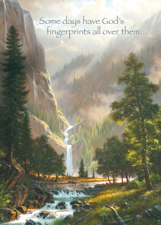 Religious magnet featuring a majestic waterfall cascading down a mountain, lush forest, river, and deer, with text 'God's fingerprints'.