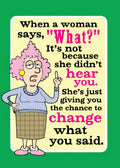 Humorous fridge magnet featuring a cartoon woman with pink hair pointing, with the text 'When a woman says, "What?" It's not because she didn't hear you. She's just giving you the chance to change what you said.'