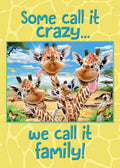 Funny giraffe family magnet featuring cartoon giraffes sticking tongues out, set against a bright savanna backdrop with butterflies and a meerkat, displaying the quote 'Some call it crazy... we call it family!'. Perfect for refrigerator or locker.