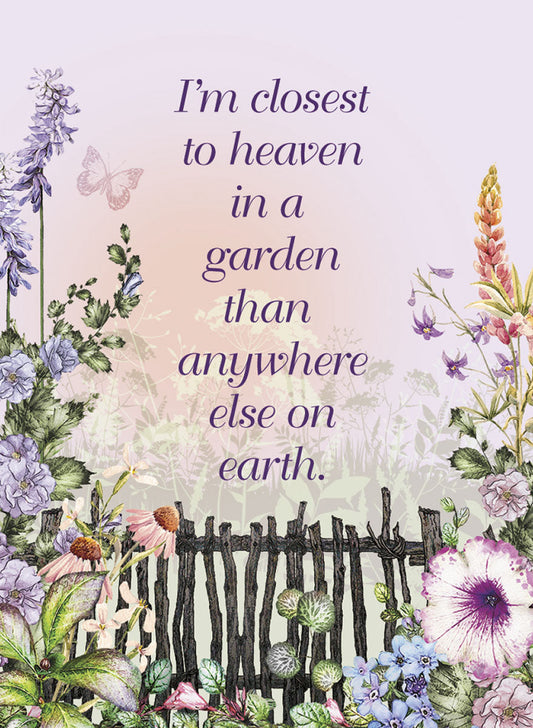 Garden magnet with purple and pink flowers, a small fence, and a butterfly, featuring the quote 'I'm closest to heaven in a garden than anywhere else on earth.'