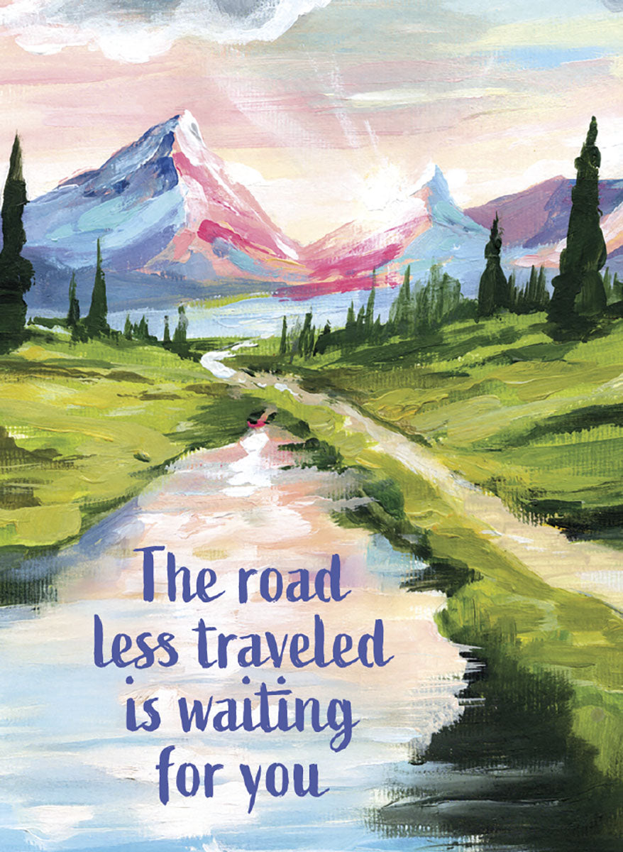 Vibrant acrylic painting magnet depicting a majestic mountain landscape with a winding path, a serene lake, and a glowing sunrise. The text 'The road less traveled is waiting for you' is prominently displayed in blue script, offering a message of encouragement and adventure.
