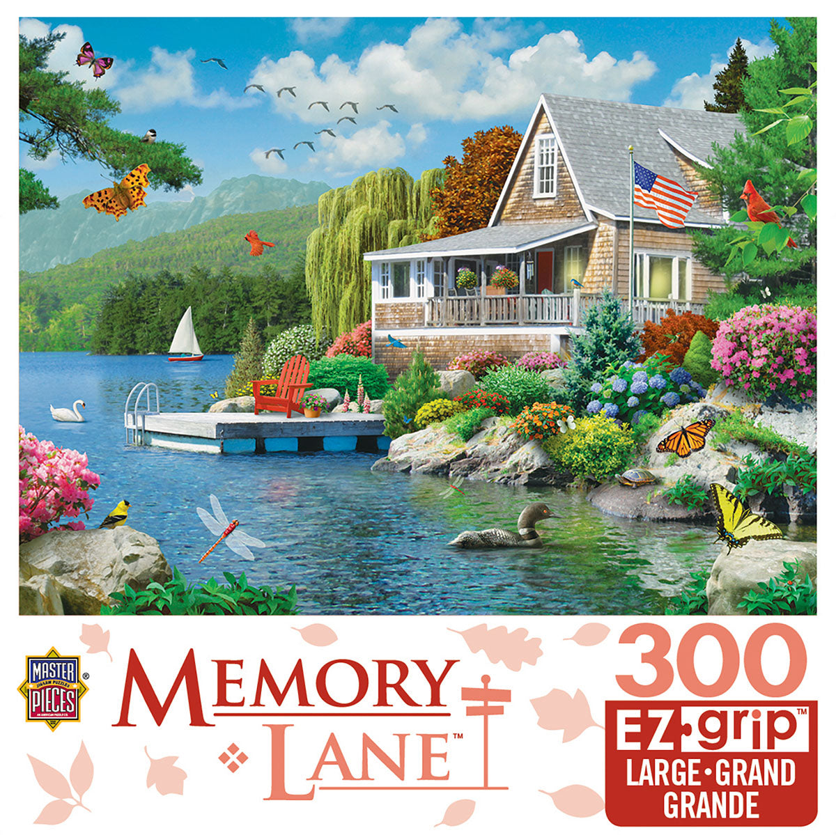 MasterPieces Memory Lane 300-piece EZ-grip jigsaw puzzle depicting a tranquil lakeside cottage with a dock, American flag, sailboat, vibrant garden flowers, lush trees, mountains, and diverse wildlife including butterflies, swan, loon, and cardinal bird, ideal for adults and families seeking relaxation.