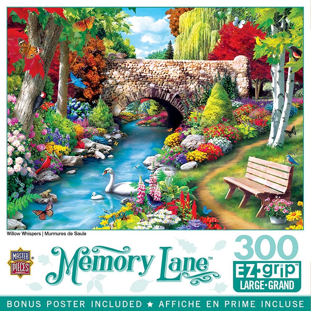 Vibrant 300-piece MasterPieces Memory Lane jigsaw puzzle featuring a serene natural landscape. The image shows a stone arch bridge spanning a winding blue river, surrounded by lush, colorful gardens with various flowers, trees, a pair of white swans, butterflies, and birds like a red cardinal and bluebird. A wooden bench sits on a grassy path, inviting relaxation. Ideal for adults seeking a picturesque, easy-grip puzzle.