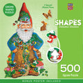 MasterPieces 500-piece 'Shapes Garden Gnome' jigsaw puzzle. Features a large, colorful gnome shape with intricate nature and forest path illustrations, including special butterfly, rabbit, and mushroom shaped pieces. Includes bonus poster for assembly.