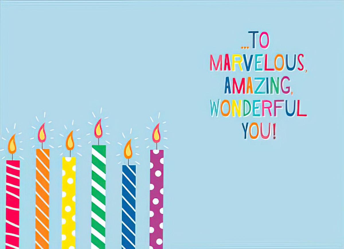 Inside of a birthday card, blue background with '...TO MARVELOUS, AMAZING, WONDERFUL YOU!' in colorful text and candles.
