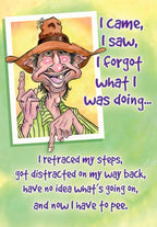 Front of a humorous birthday card featuring a cartoon man in a brown hat, pointing comically. Text reads: "I came, I saw, I forgot what I was doing... I retraced my steps, got distracted on my way back, have no idea what's going on, and now I have to pee."