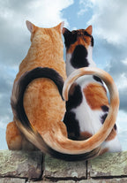 Two adorable cats, one ginger and one calico, sitting side-by-side on a stone wall with their tails intertwined into a heart shape against a cloudy blue sky, symbolizing enduring love and commitment.