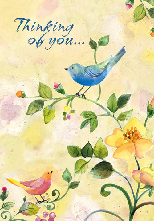 Front of a heartfelt greeting card featuring a blue bird and a pink bird on a vine with yellow and pink watercolor flowers on a soft yellow background, with text 'Thinking of you...'