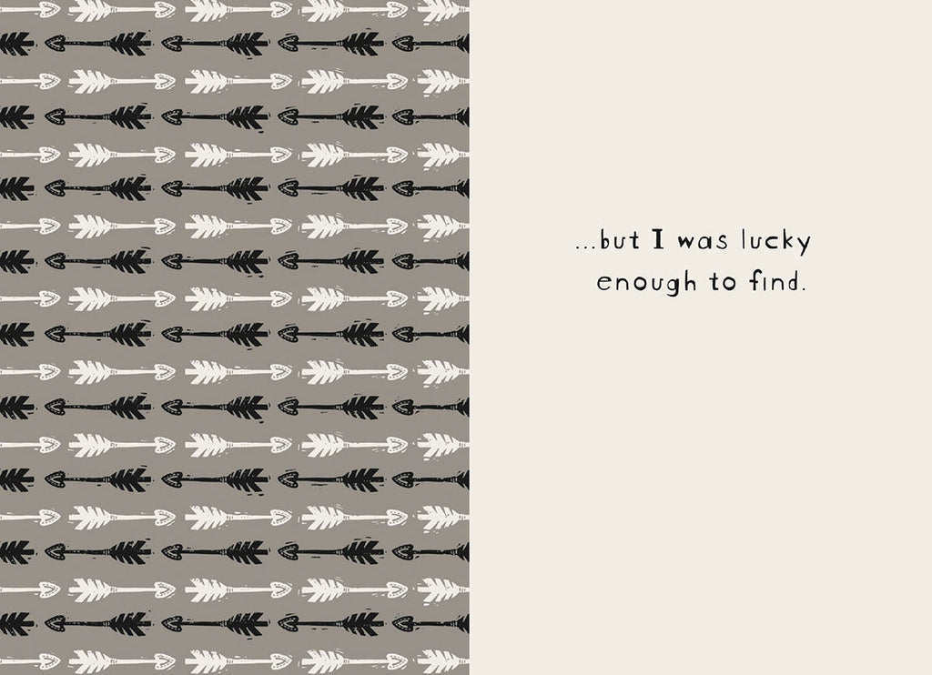 Inside view of a friendship greeting card, revealing the continuation of the message: '...but I was lucky enough to find.' The left side features a repeating pattern of black and white arrows on a grey background, while the right side has the simple, handwritten-style text on a light cream background, emphasizing a deep, personal bond.