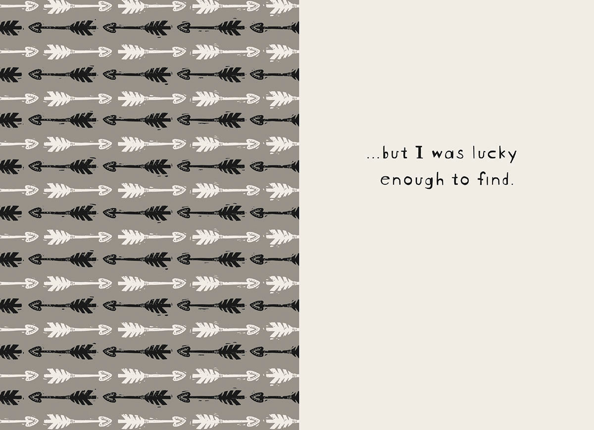 Inside view of a friendship greeting card, revealing the continuation of the message: '...but I was lucky enough to find.' The left side features a repeating pattern of black and white arrows on a grey background, while the right side has the simple, handwritten-style text on a light cream background, emphasizing a deep, personal bond.